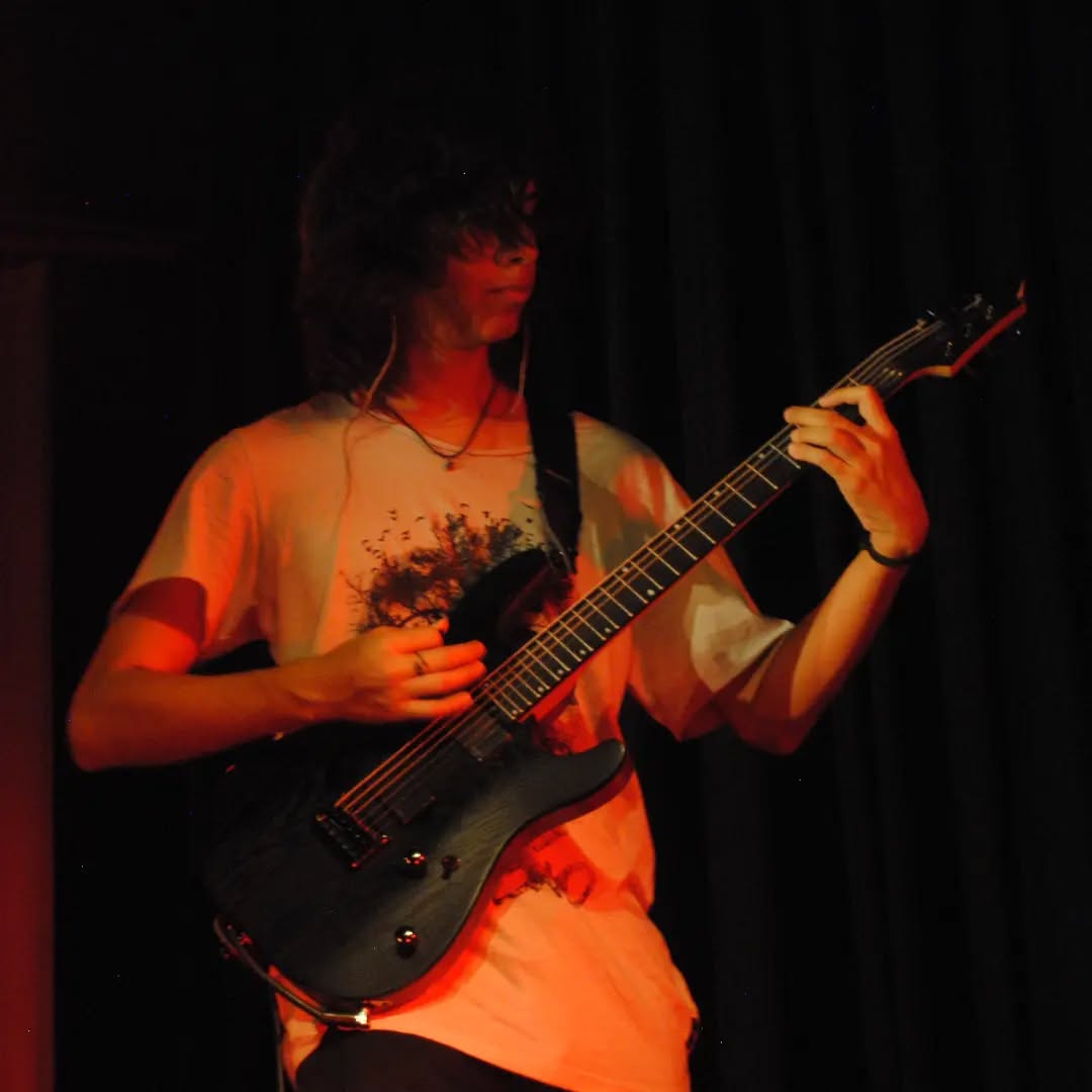 Felipe Martínez - Rhythm Guitar